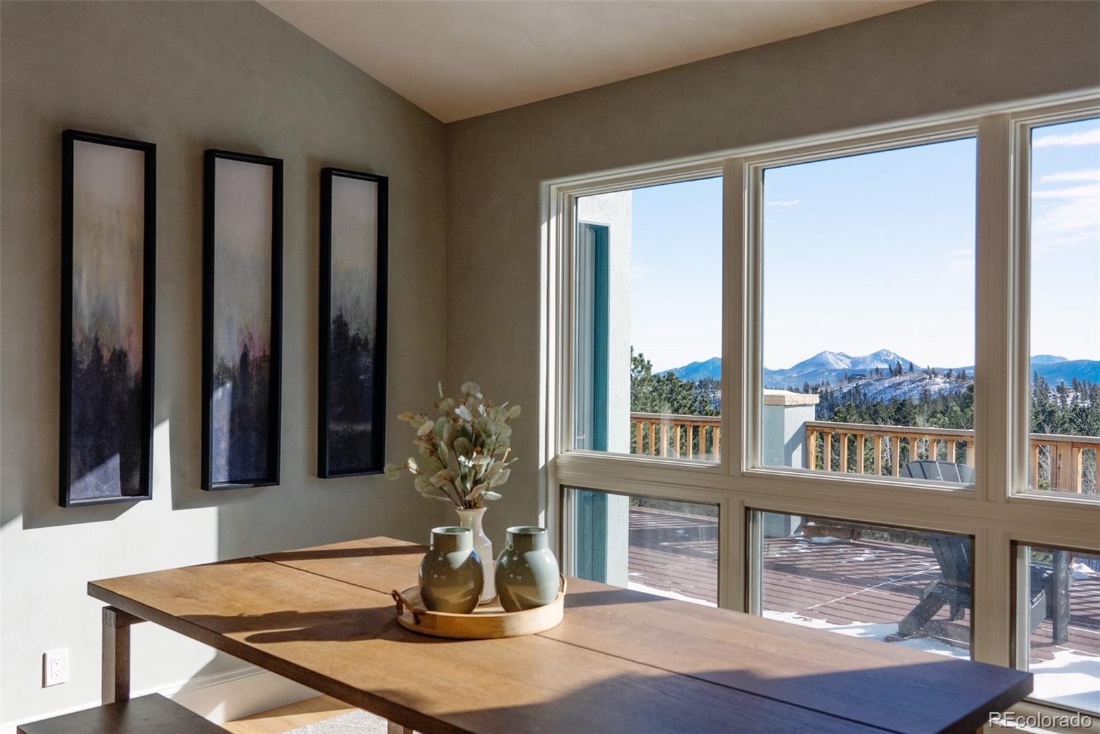 240 Dixon Road Boulder, CO 80302 - Photo 11 of 40 a view of a dining room with furniture window and wooden floor