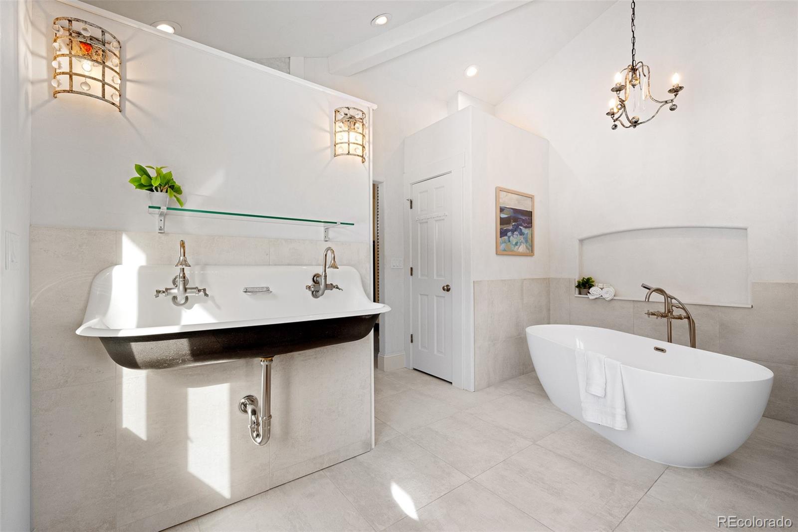 240 Dixon Road Boulder, CO 80302 - Photo 22 of 40 a bathroom with a sink and a mirror
