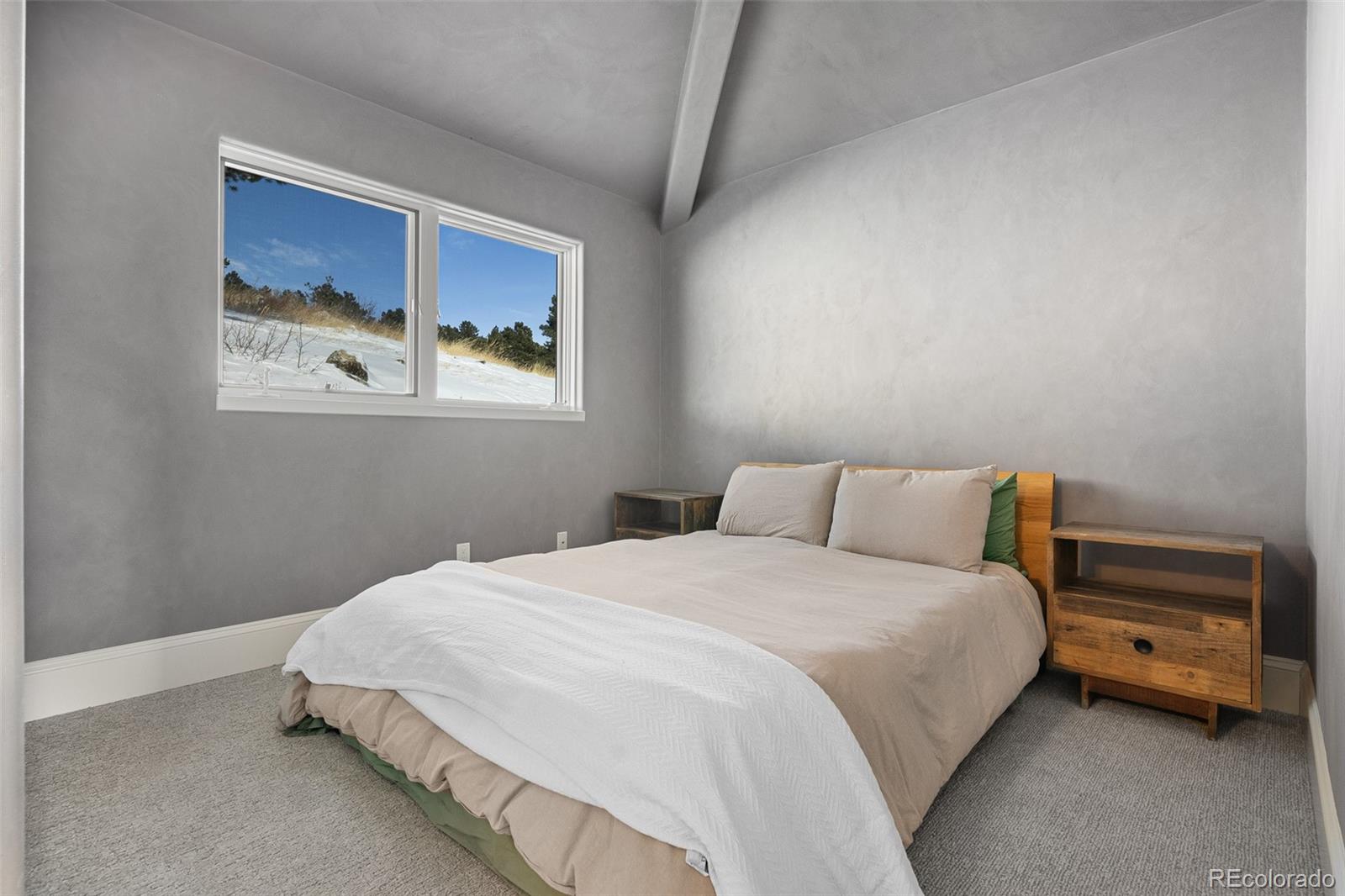 240 Dixon Road Boulder, CO 80302 - Photo 31 of 40 a bedroom with a bed and a window