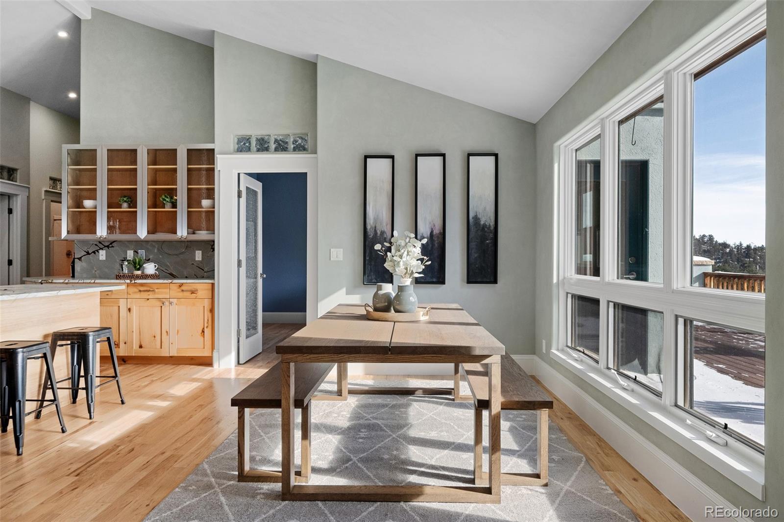 240 Dixon Road Boulder, CO 80302 - Photo 9 of 40 a view of a dining room with furniture window and wooden floor