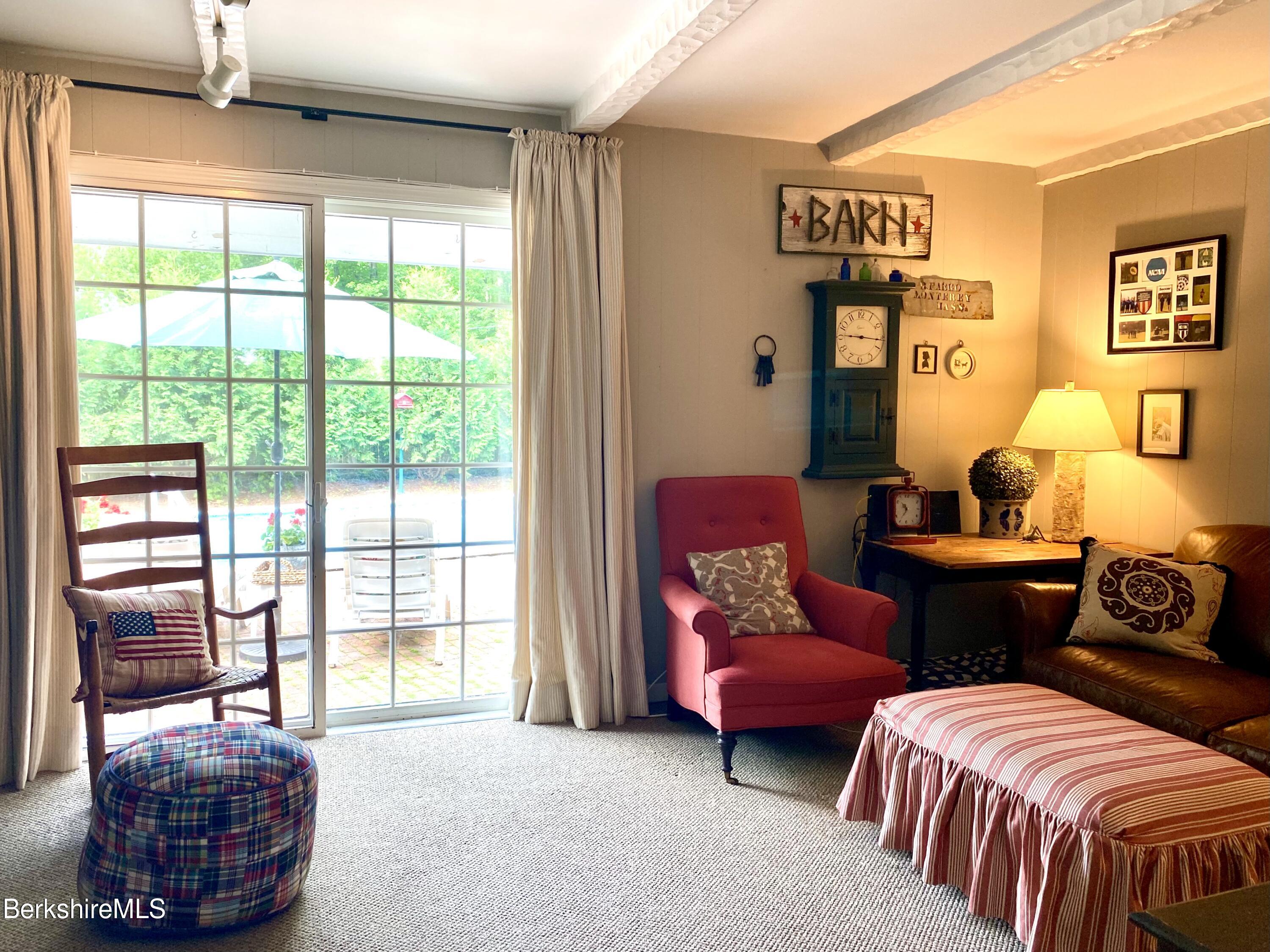 501 Holmes Road Pittsfield, MA 01201 - Photo 12 of 30 a living room with furniture and a window