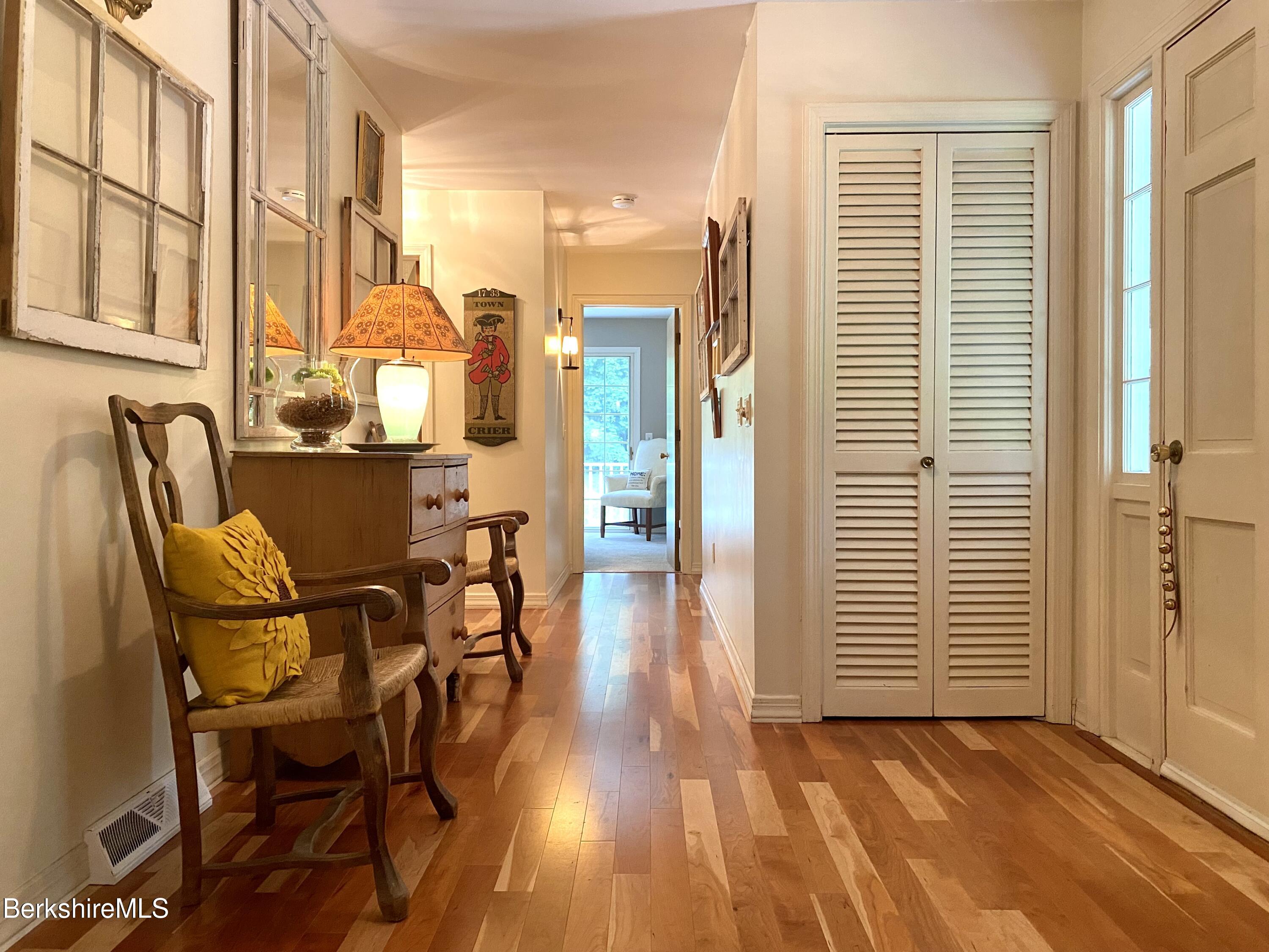 501 Holmes Road Pittsfield, MA 01201 - Photo 14 of 30 a view of a room with furniture and wooden floor