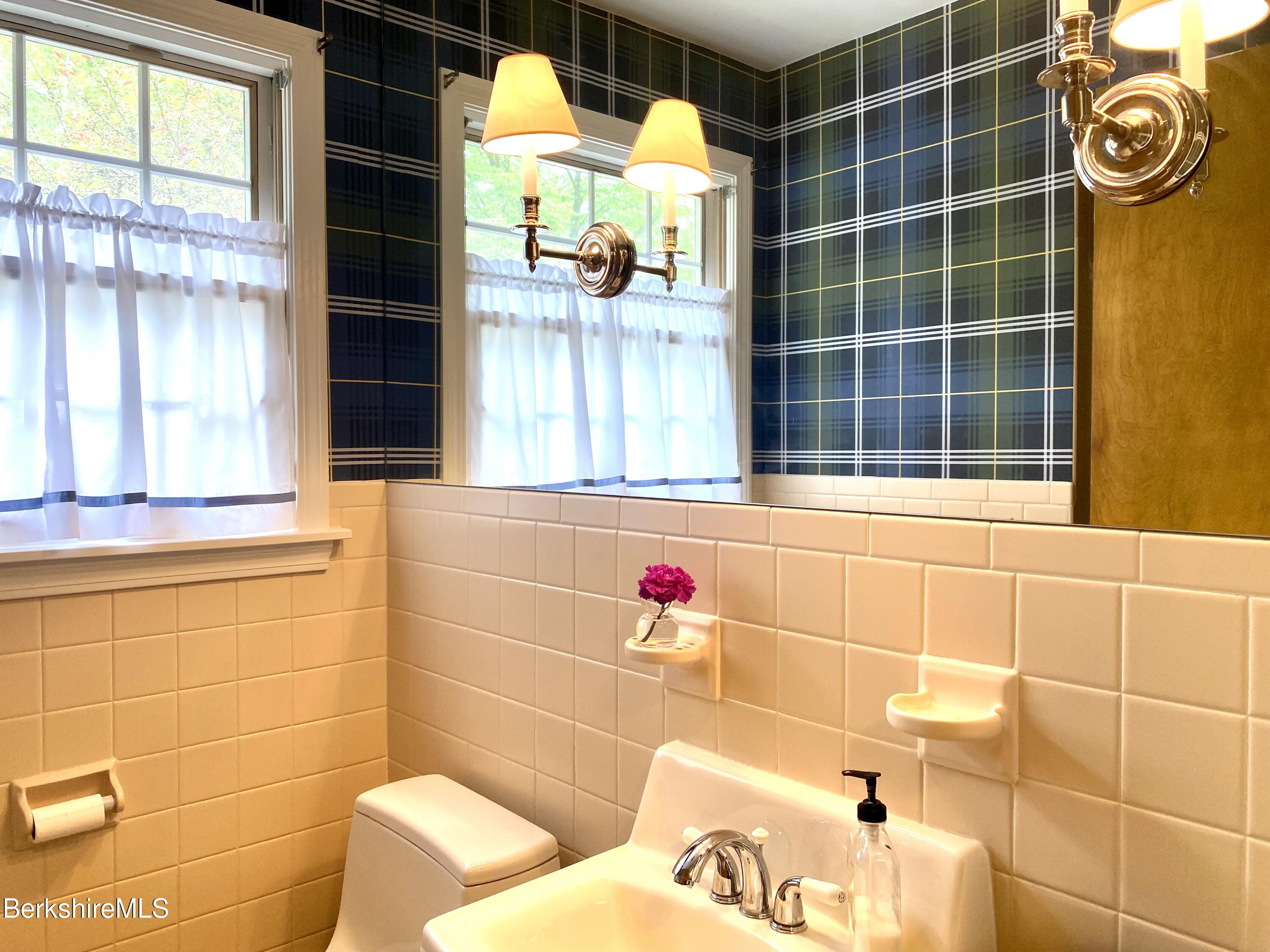 501 Holmes Road Pittsfield, MA 01201 - Photo 15 of 30 a bathroom with a sink and a shower