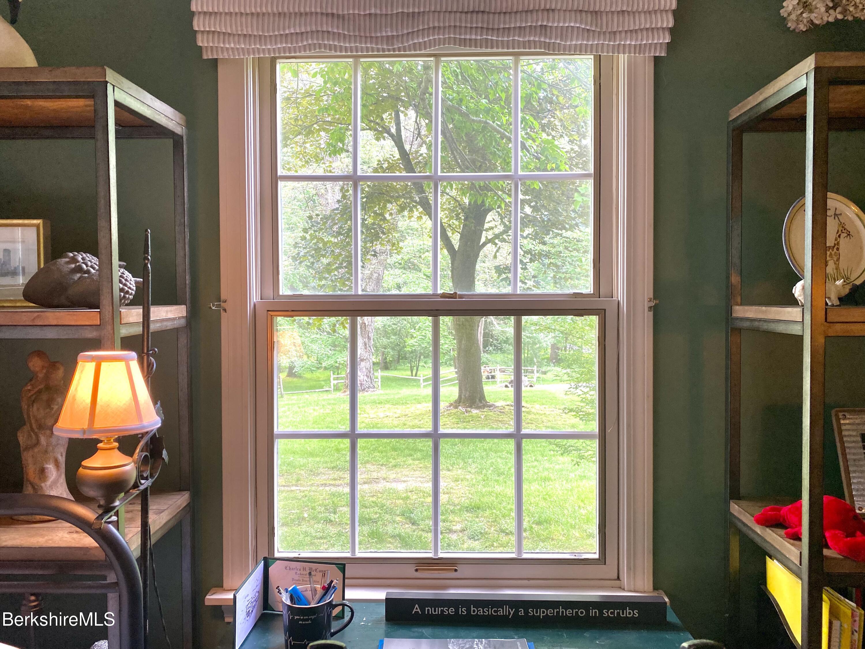 501 Holmes Road Pittsfield, MA 01201 - Photo 17 of 30 a view of gym equipment with a window