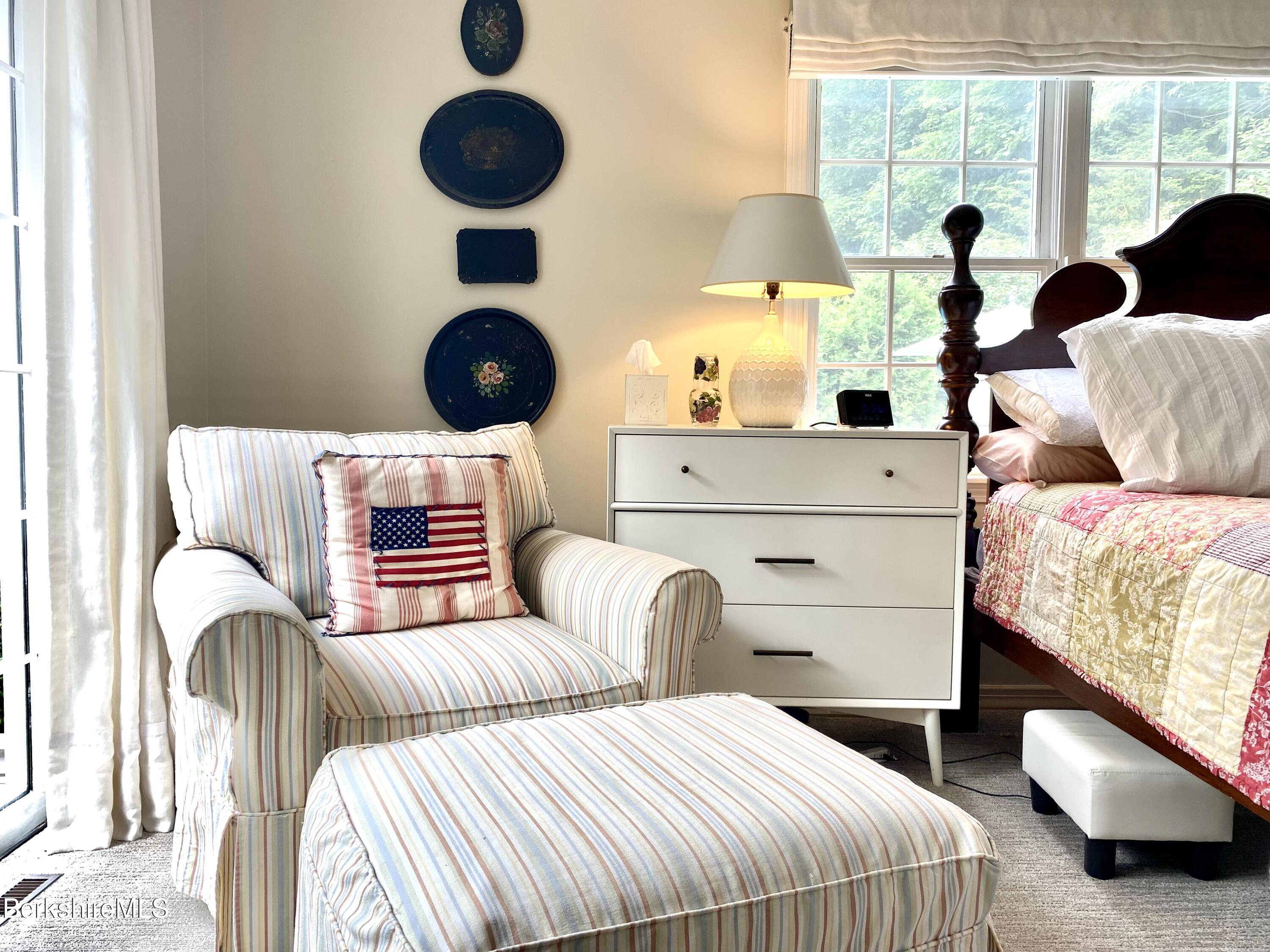 501 Holmes Road Pittsfield, MA 01201 - Photo 18 of 30 a bedroom with two beds and a large window