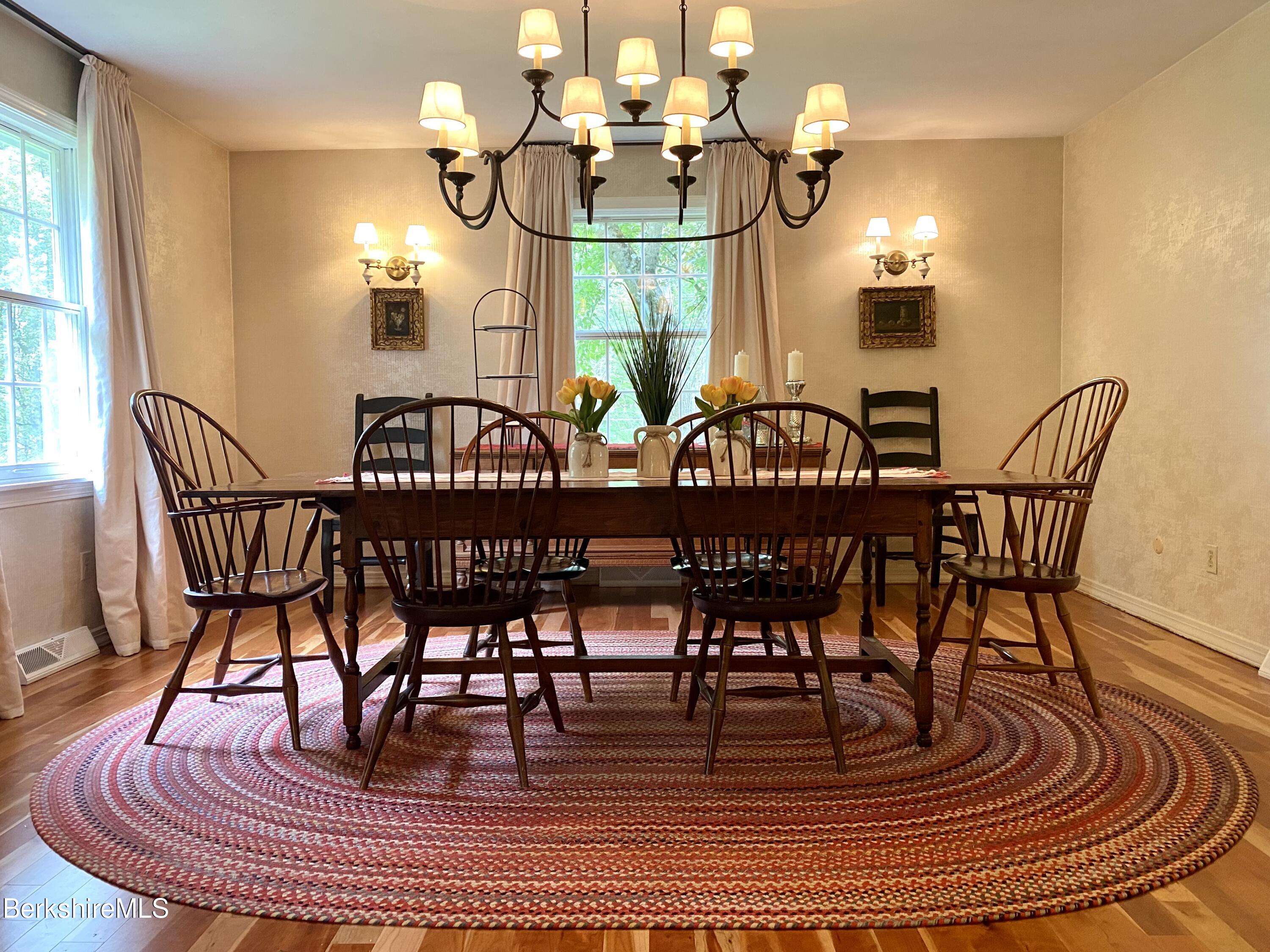 501 Holmes Road Pittsfield, MA 01201 - Photo 7 of 30 a view of a dining room with furniture window and wooden floor