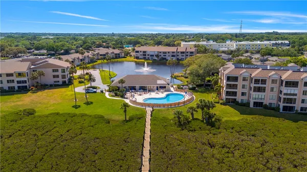 a view of a lake with a house
