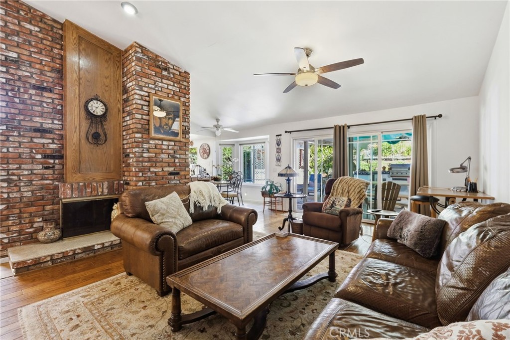 18233 Charlton Lane Porter Ranch, CA 91326 - Photo 31 of 40 a living room with furniture and a large window