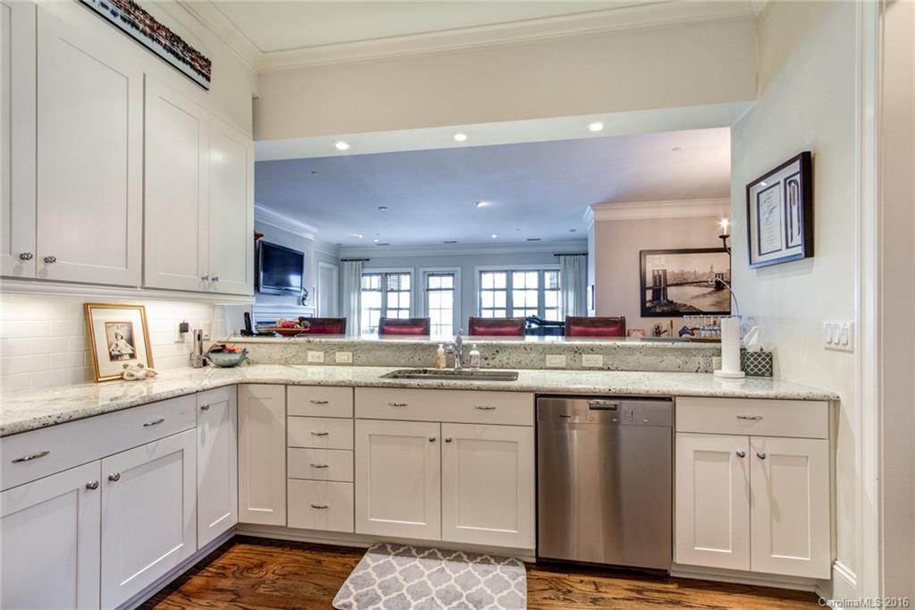 2823 Providence Road, Unit 255 Charlotte, NC 28211 - Photo 13 of 24 a kitchen with white cabinets