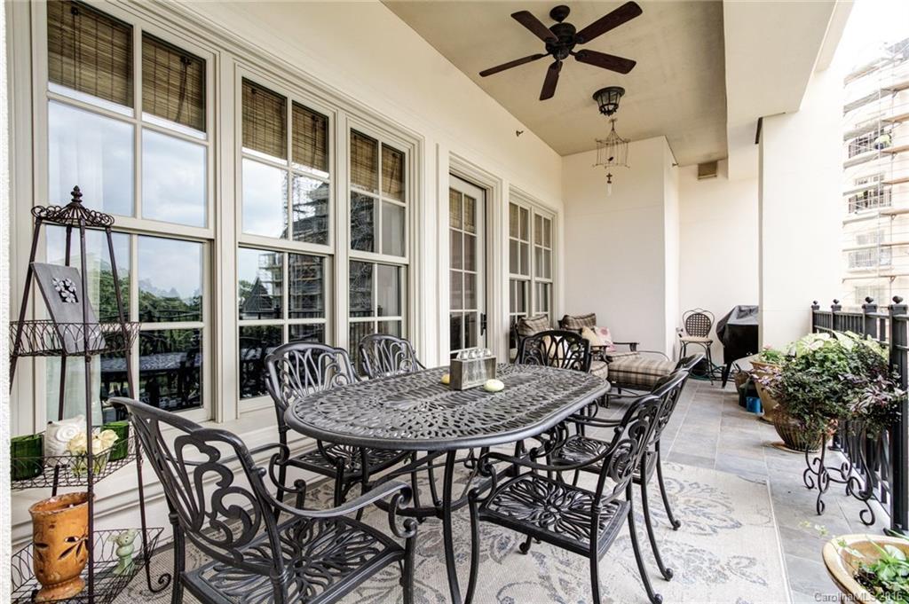 2823 Providence Road, Unit 255 Charlotte, NC 28211 - Photo 21 of 24 a view of a dinning table and chairs in patio
