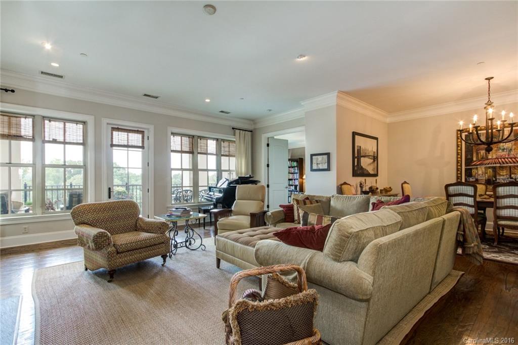 2823 Providence Road, Unit 255 Charlotte, NC 28211 - Photo 6 of 24 a living room with furniture and large windows
