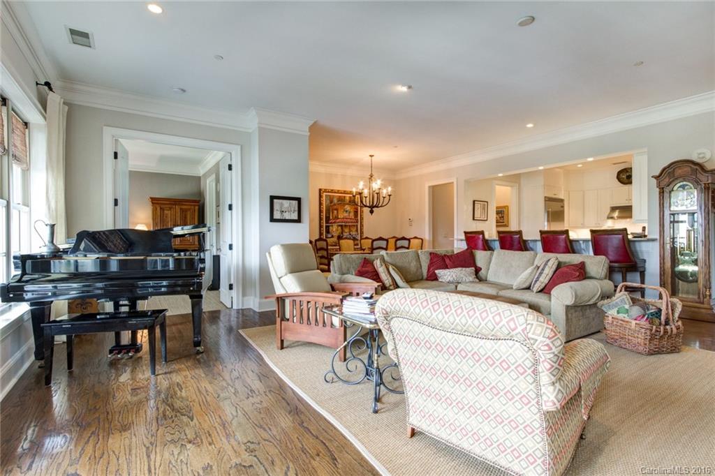 2823 Providence Road, Unit 255 Charlotte, NC 28211 - Photo 8 of 24 a living room with furniture and wooden floor