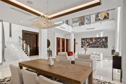 a view of a kitchen area kitchen island furniture and refrigerator