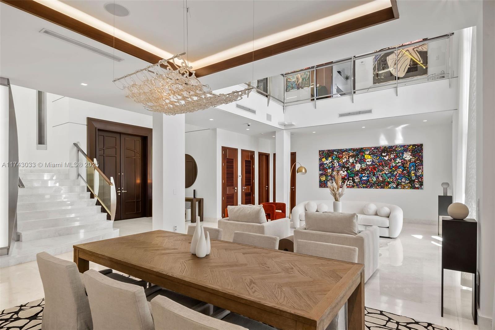 8955 Southwest 63rd Court Pinecrest, FL 33156 - Photo 19 of 59 a living room with furniture and a flat screen tv