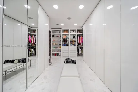 a view of a wooden deck with a yard