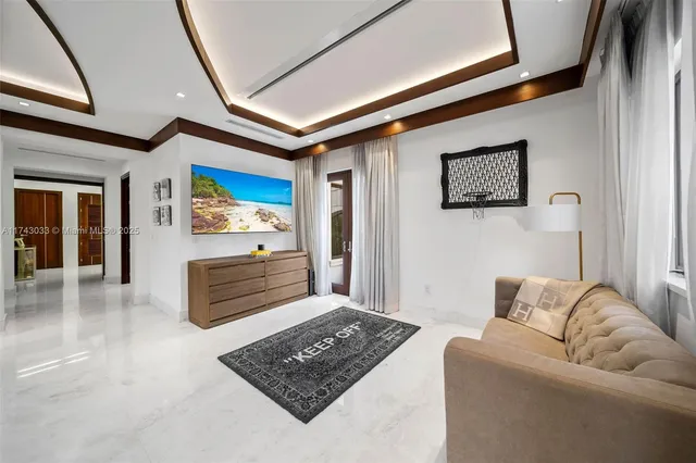 a kitchen with granite countertop white cabinets and sink