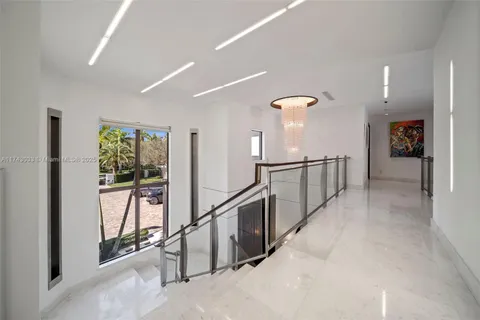 a view of a house with basketball court