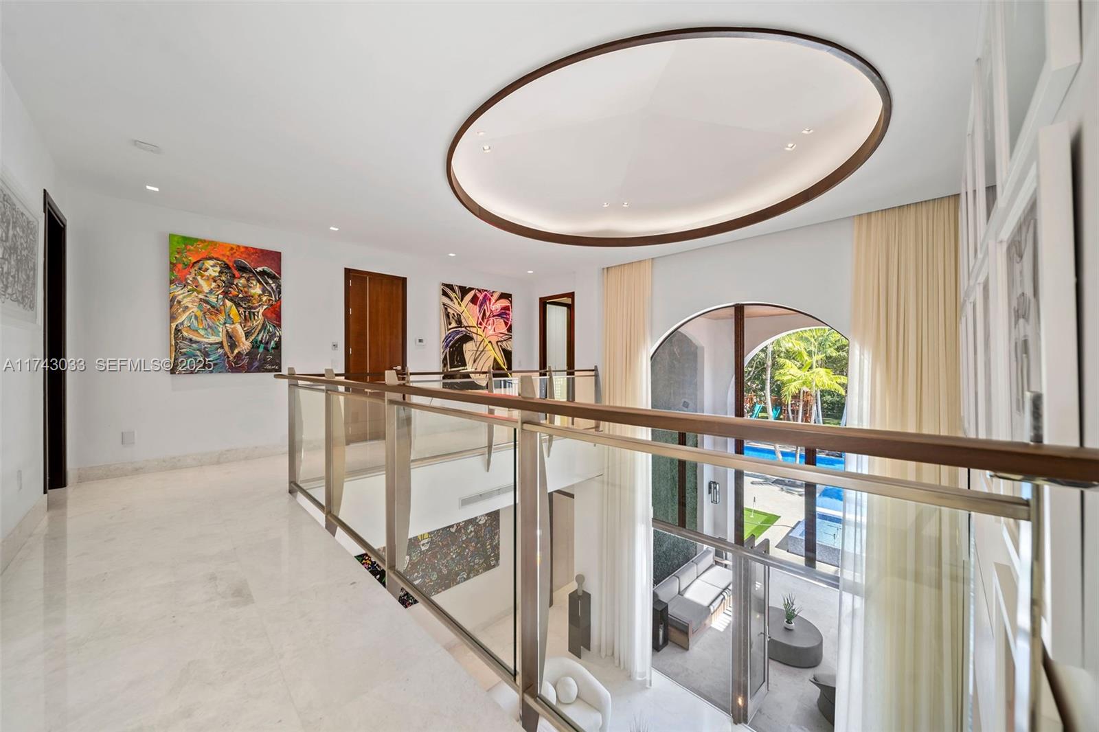 8955 Southwest 63rd Court Pinecrest, FL 33156 - Photo 43 of 59 a view of a entryway with wooden floor