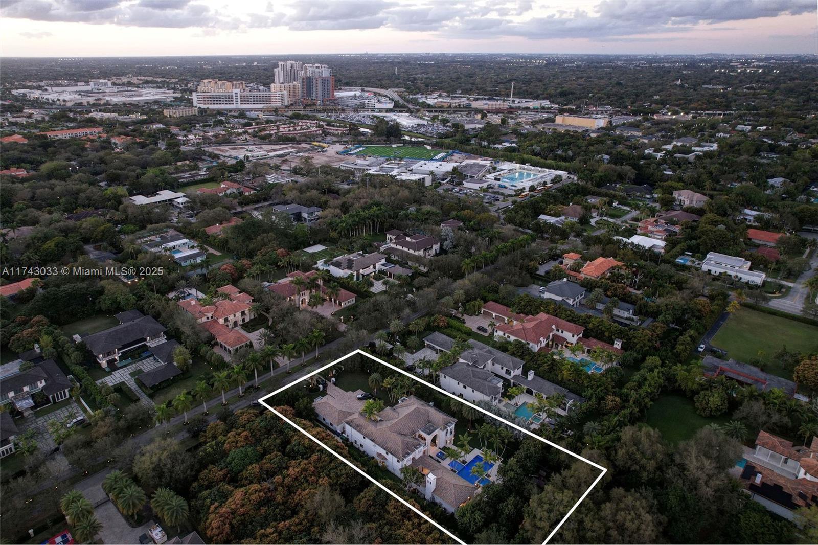 8955 Southwest 63rd Court Pinecrest, FL 33156 - Photo 54 of 59 an aerial view of multiple house