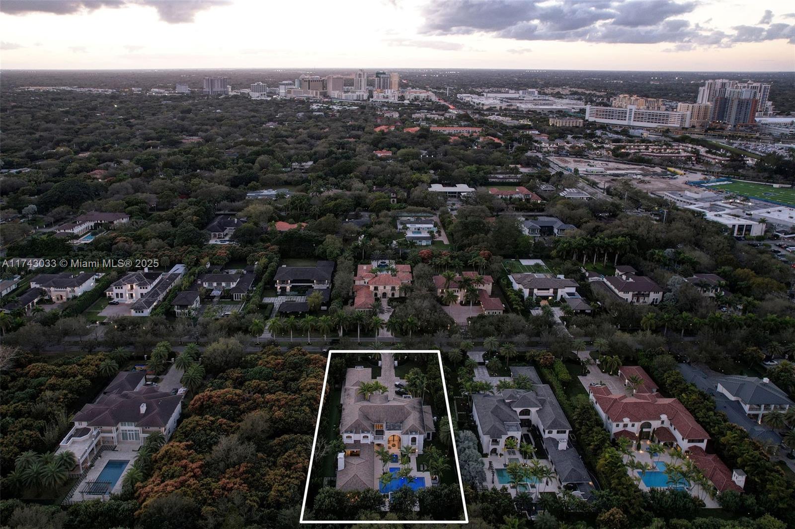 8955 Southwest 63rd Court Pinecrest, FL 33156 - Photo 55 of 59 an aerial view of multiple house