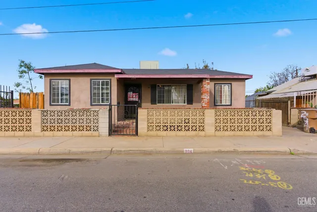 a front view of a house with a garage