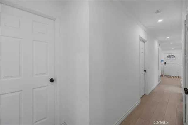 a bedroom with a bed and a closet