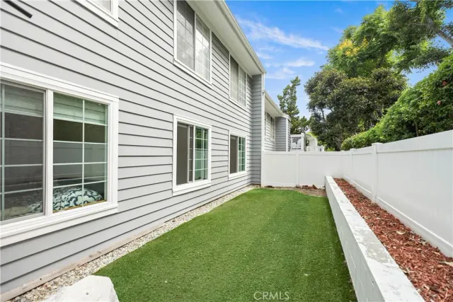 a view of a backyard with a garden