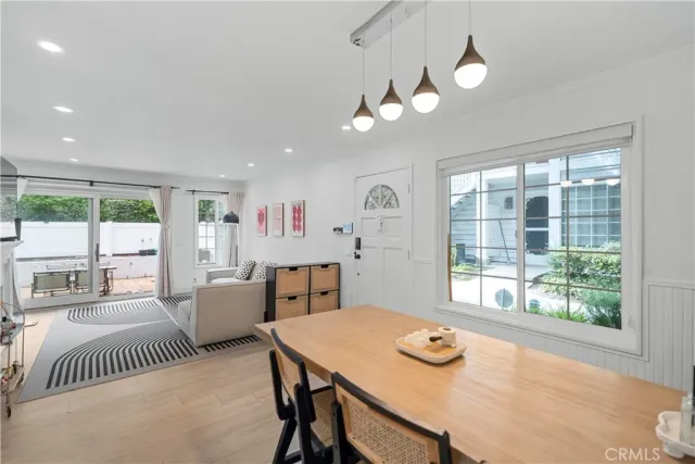 a kitchen with stainless steel appliances granite countertop a refrigerator sink and stove