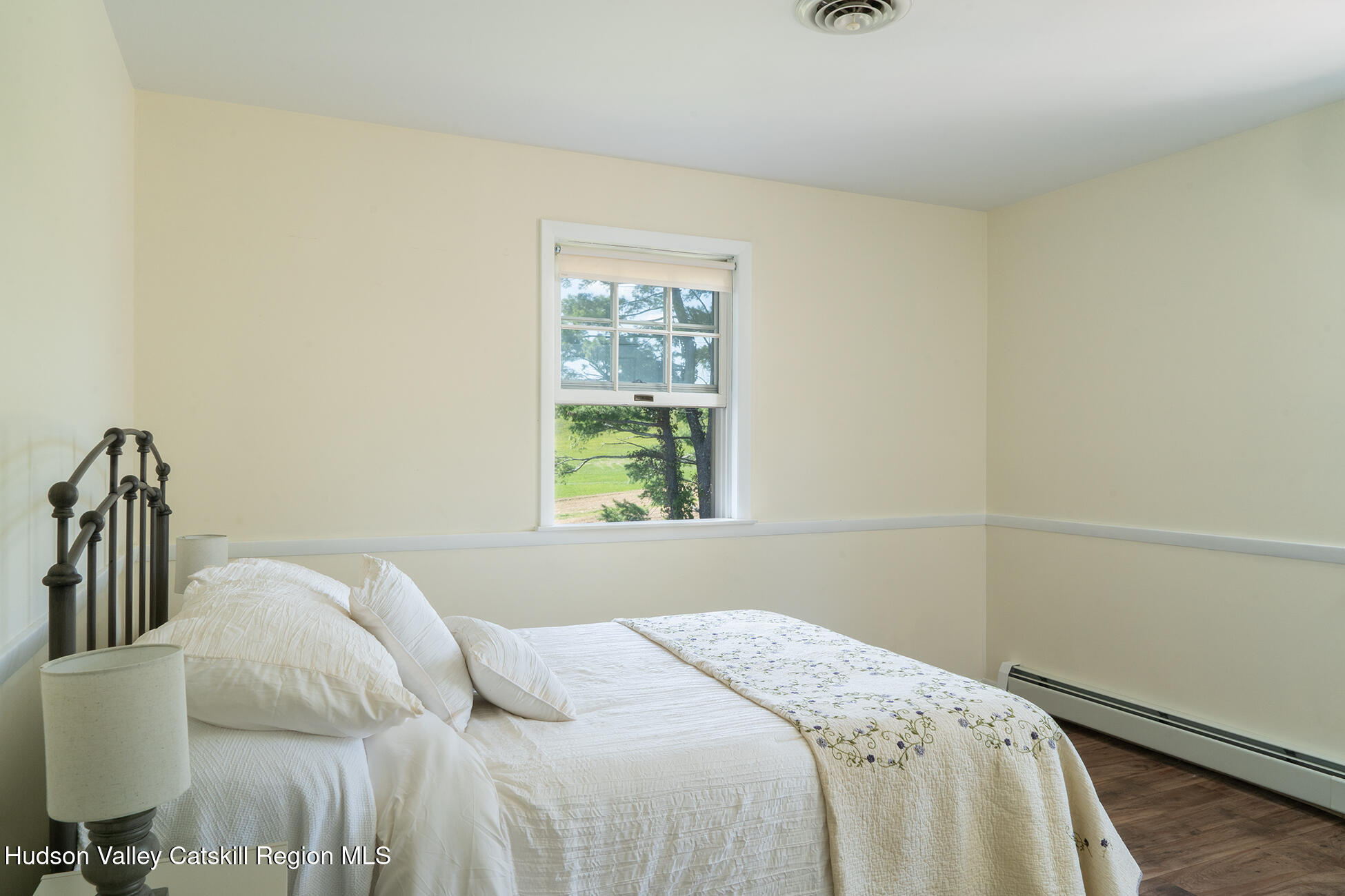 369 Highmount Road West Coxsackie, NY 12192 - Photo 15 of 24 a bedroom with a bed and window