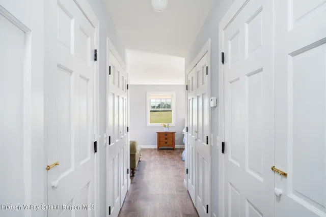 a view of a bathroom with tub and shower