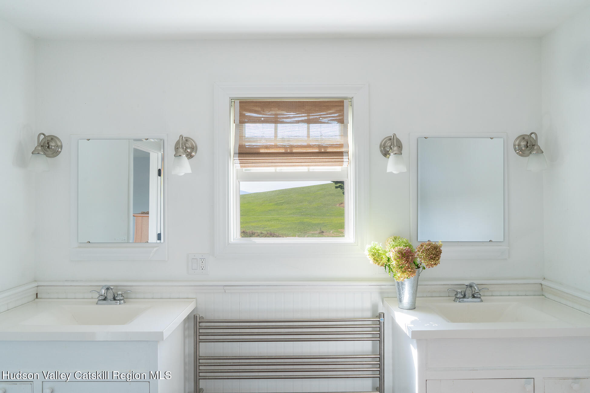 369 Highmount Road West Coxsackie, NY 12192 - Photo 18 of 24 a bathroom with a sink and a mirror