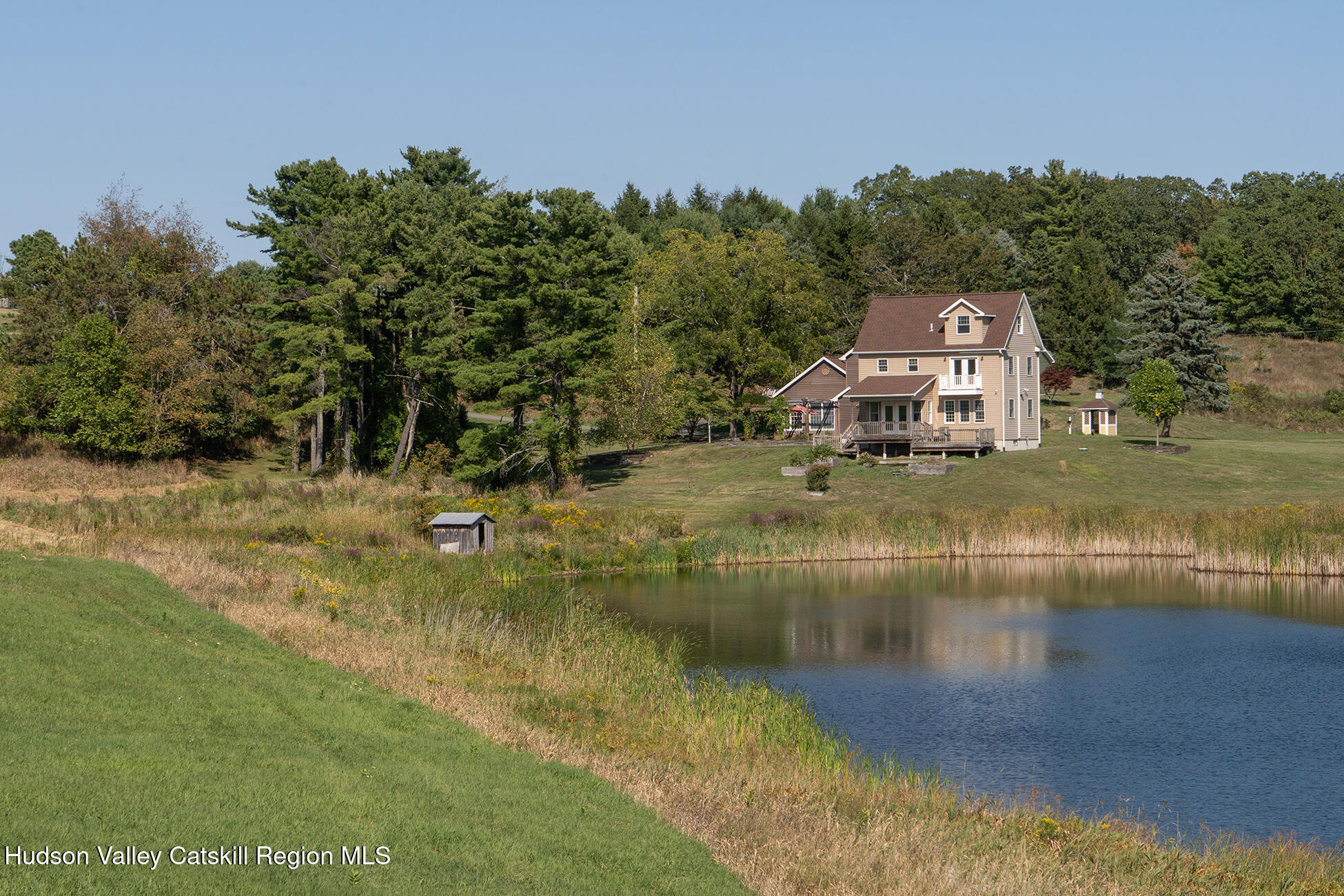 369 Highmount Road West Coxsackie, NY 12192 - Photo 21 of 24 a view of a lake with houses