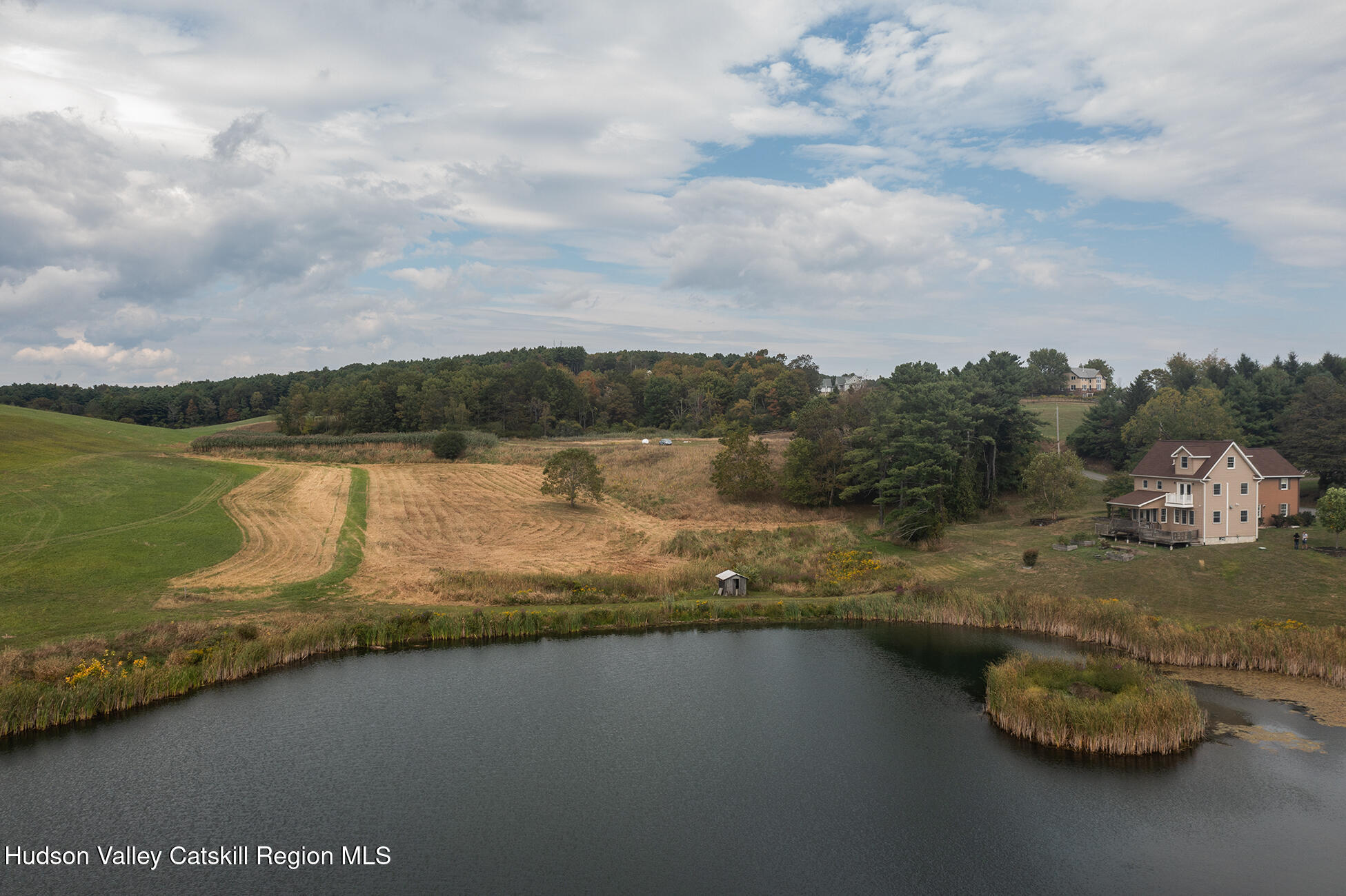 369 Highmount Road West Coxsackie, NY 12192 - Photo 22 of 24 a view of a lake from a yard