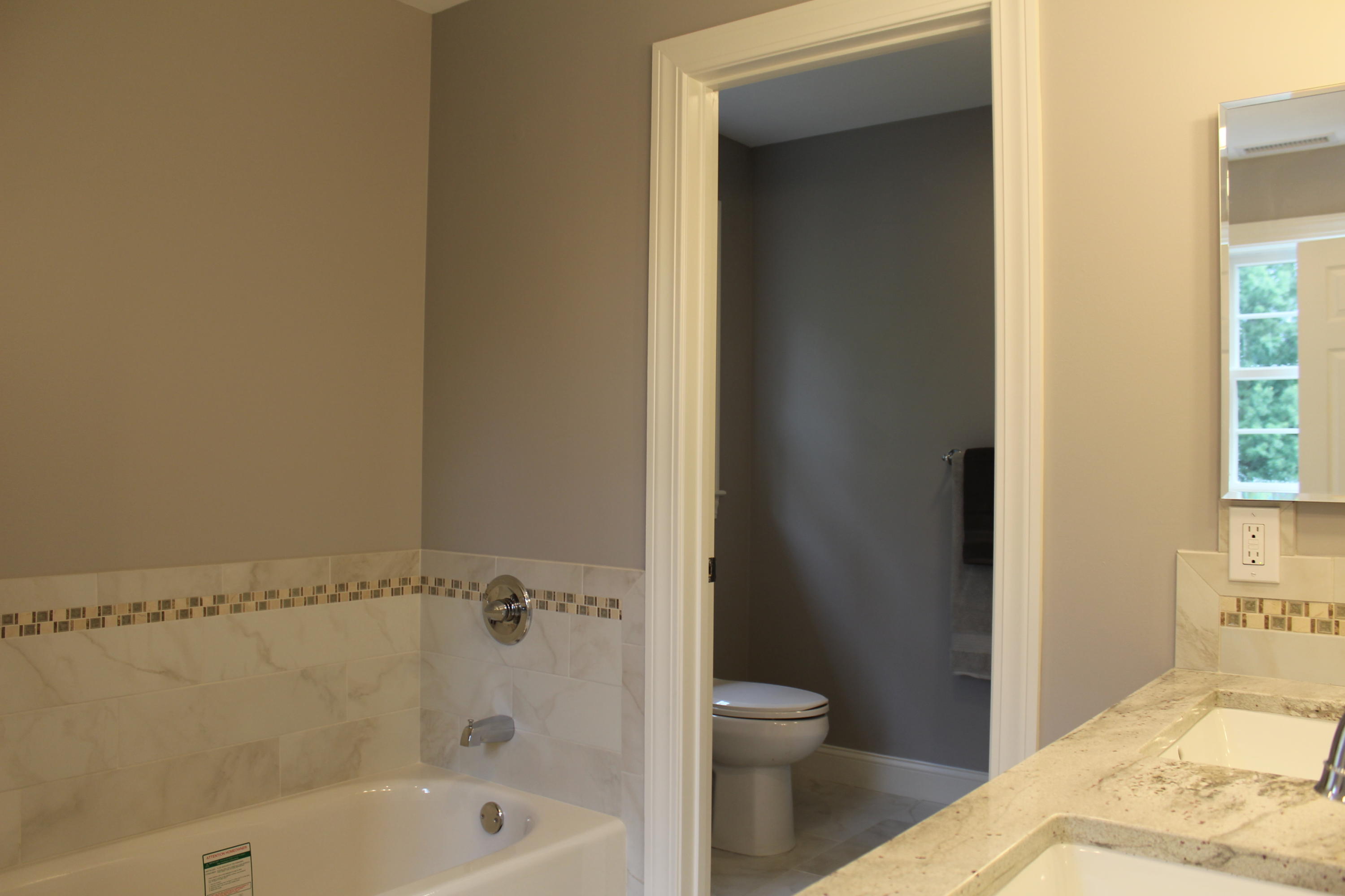 16 Knollwood Road Norwalk, CT 06854 - Photo 16 of 29 a bathroom with a bathtub and a toilet