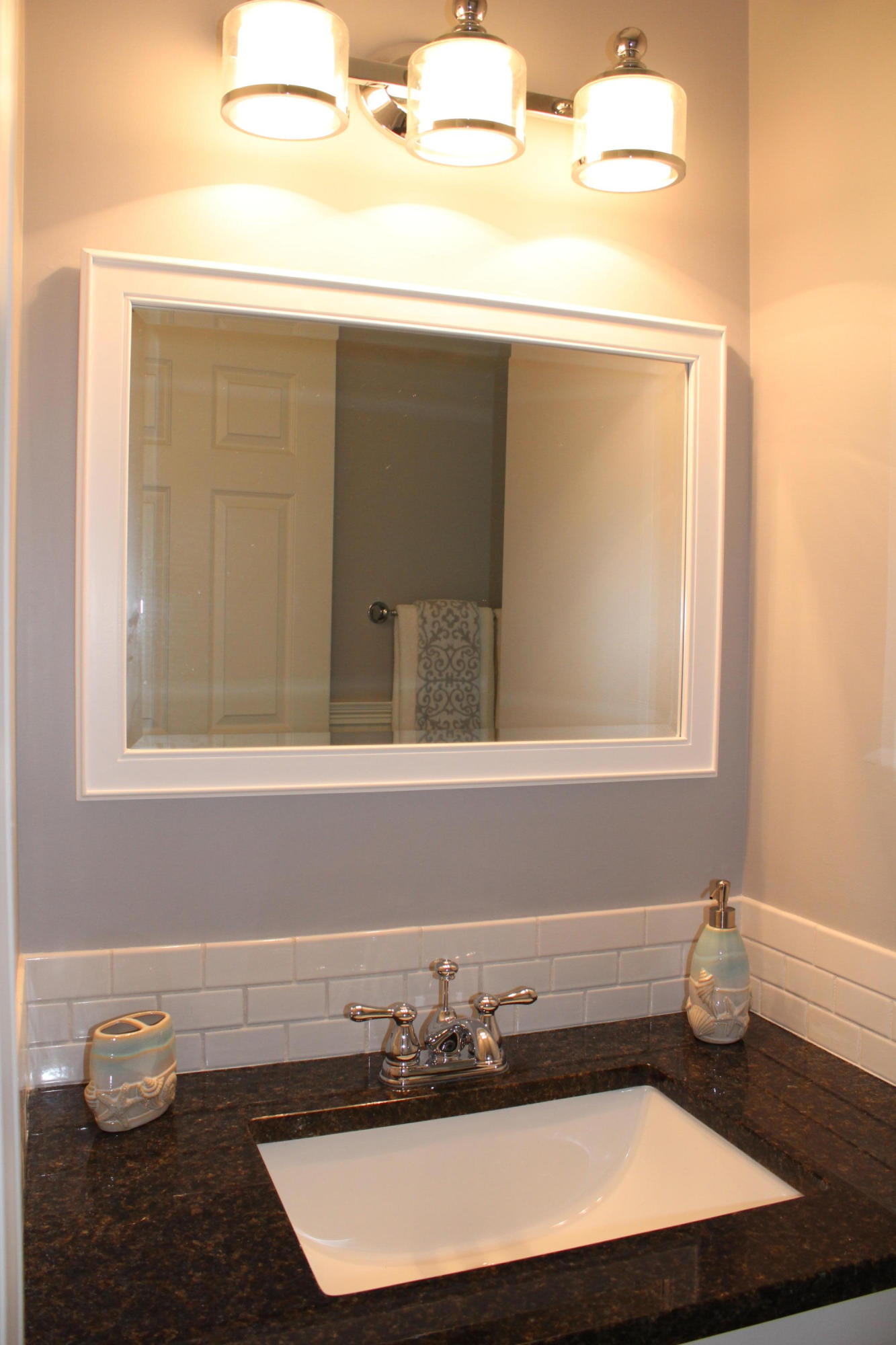 16 Knollwood Road Norwalk, CT 06854 - Photo 21 of 29 a bathroom with a sink and a mirror