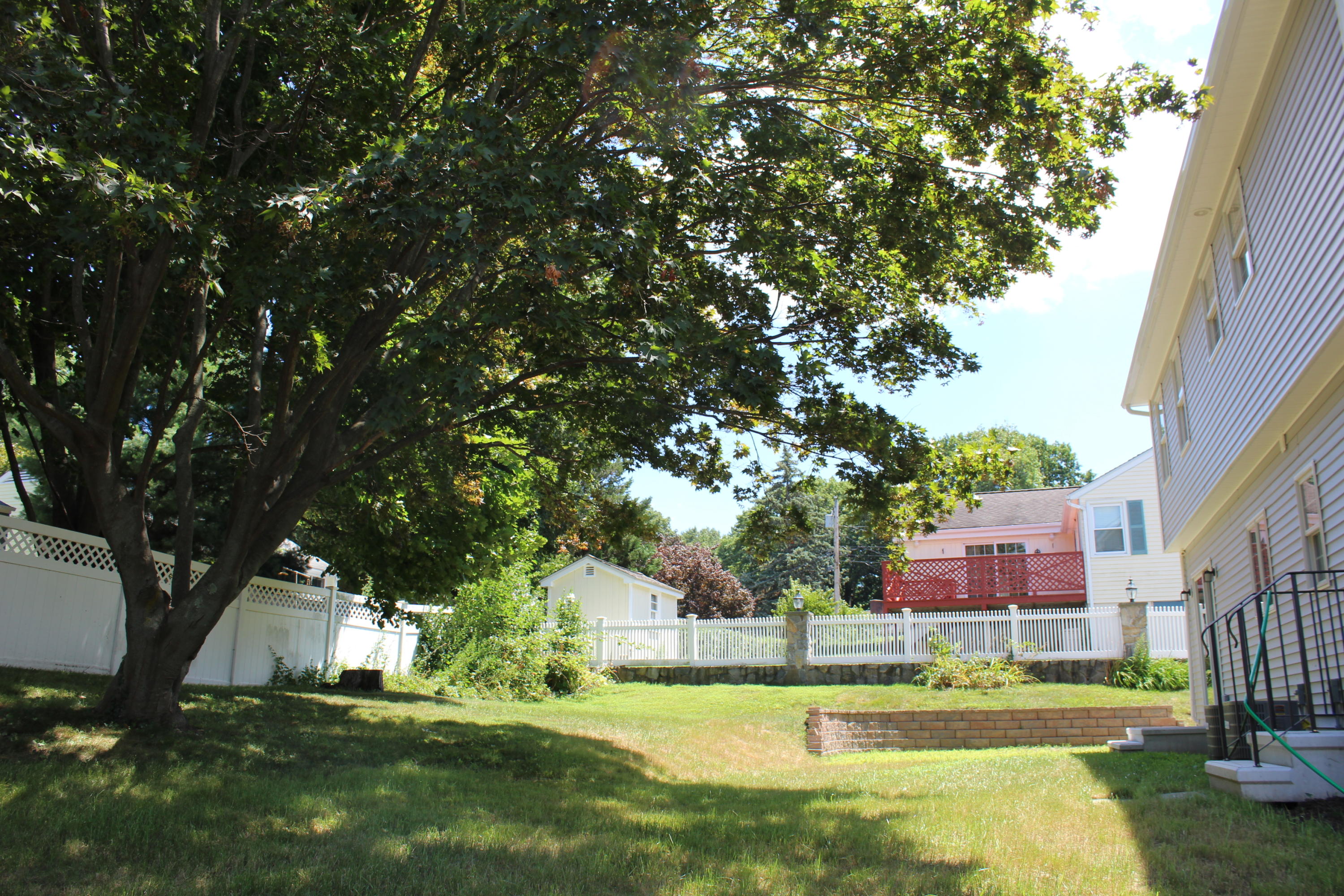 16 Knollwood Road Norwalk, CT 06854 - Photo 25 of 29 a view of a swimming pool and a yard