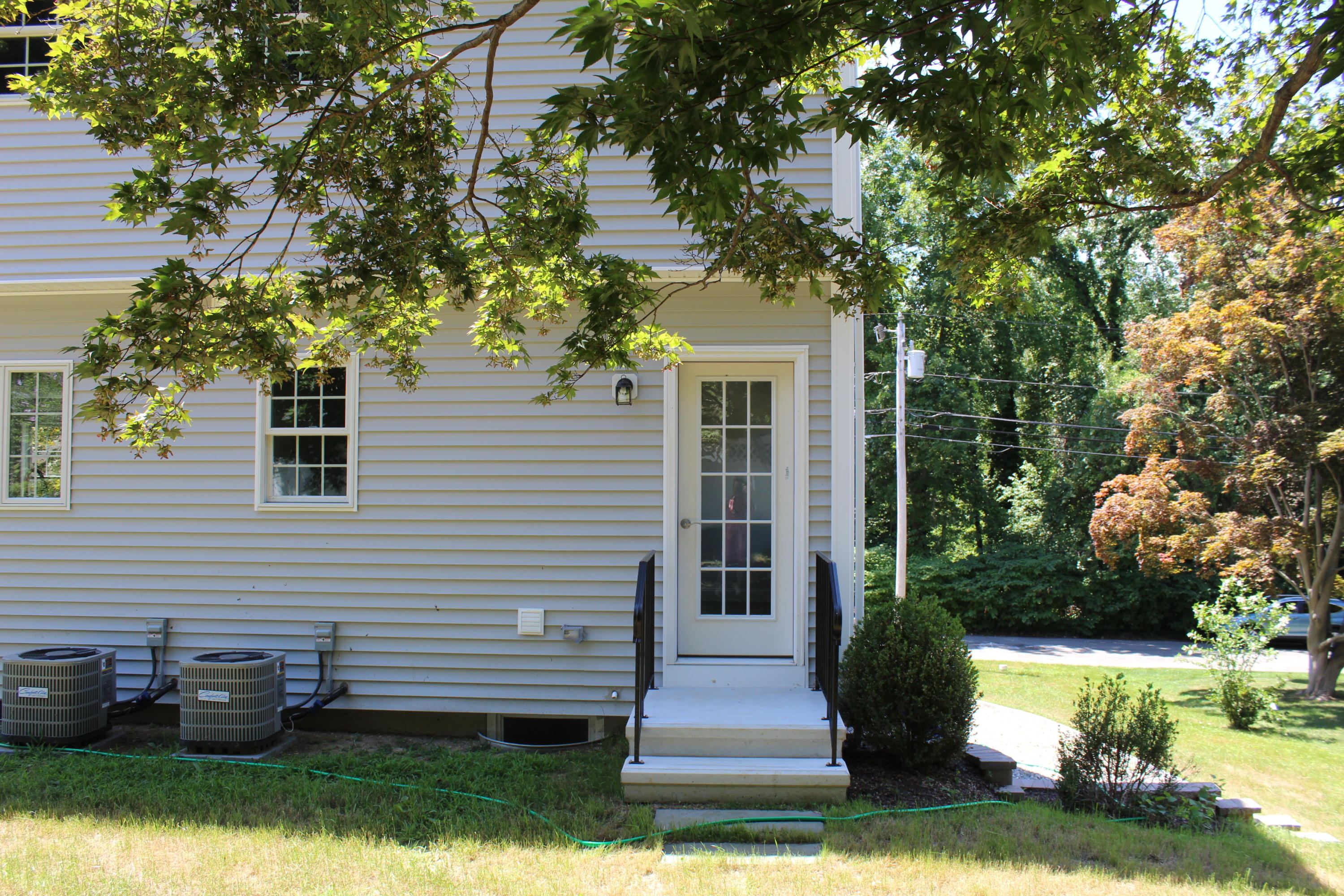 16 Knollwood Road Norwalk, CT 06854 - Photo 26 of 29 a front view of a house with a yard