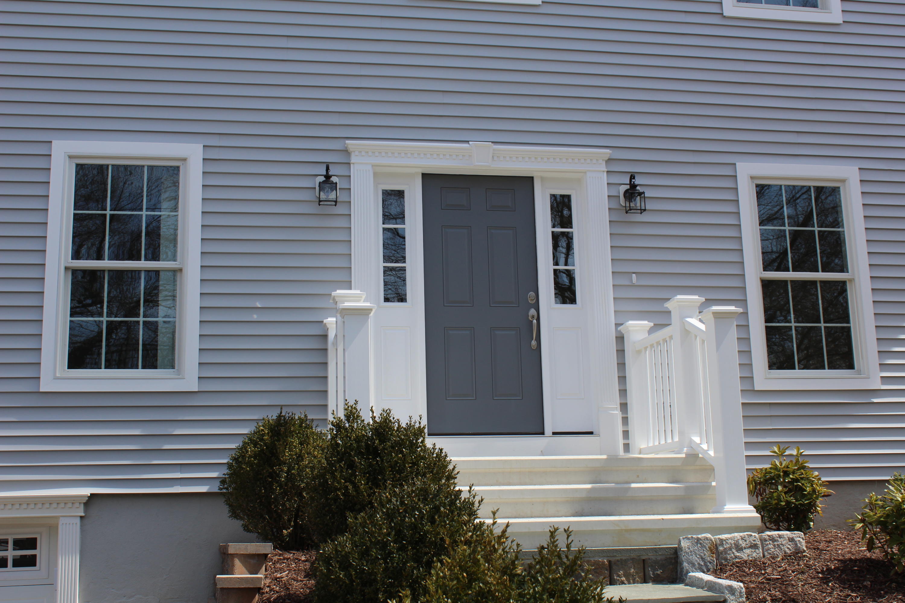 16 Knollwood Road Norwalk, CT 06854 - Photo 3 of 29 a front view of a house with a plants