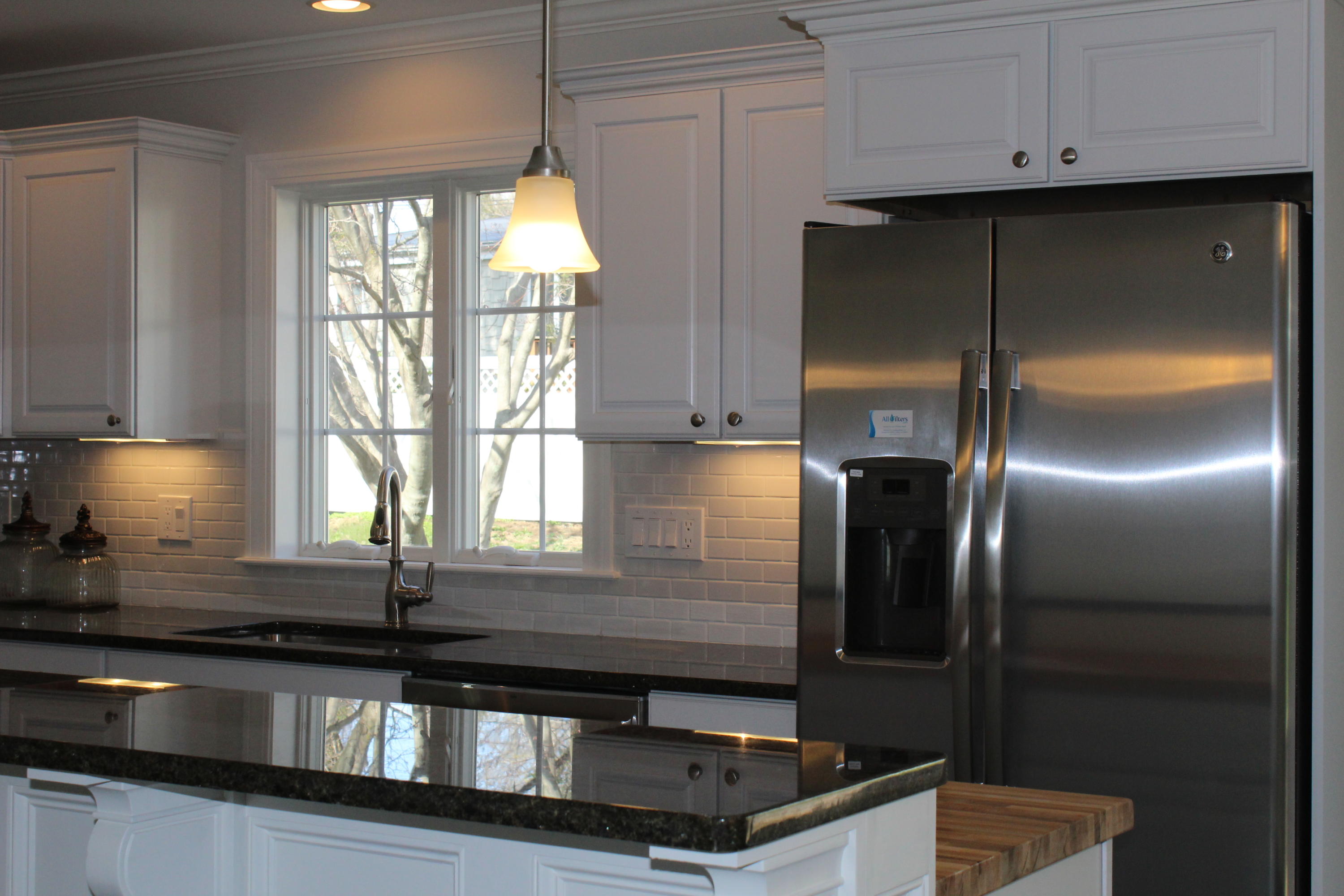 16 Knollwood Road Norwalk, CT 06854 - Photo 6 of 29 a kitchen with granite countertop stainless steel appliances and a window