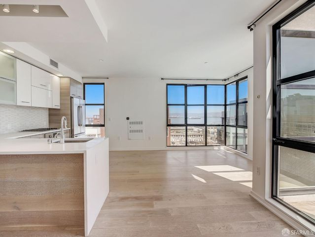 a view of a street with a big yard