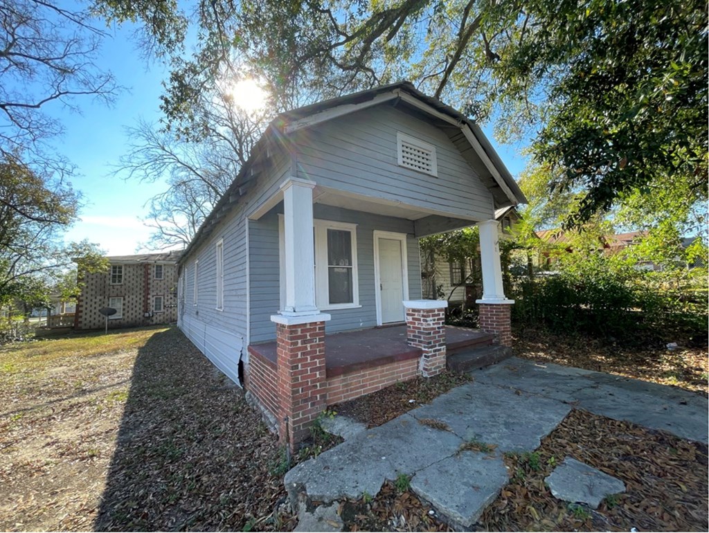 2738 Baldwin Street Columbus, GA 31906 - Photo 2 of 13 a view of a house with a yard