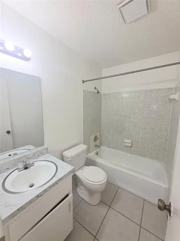 an empty room with a empty space and window