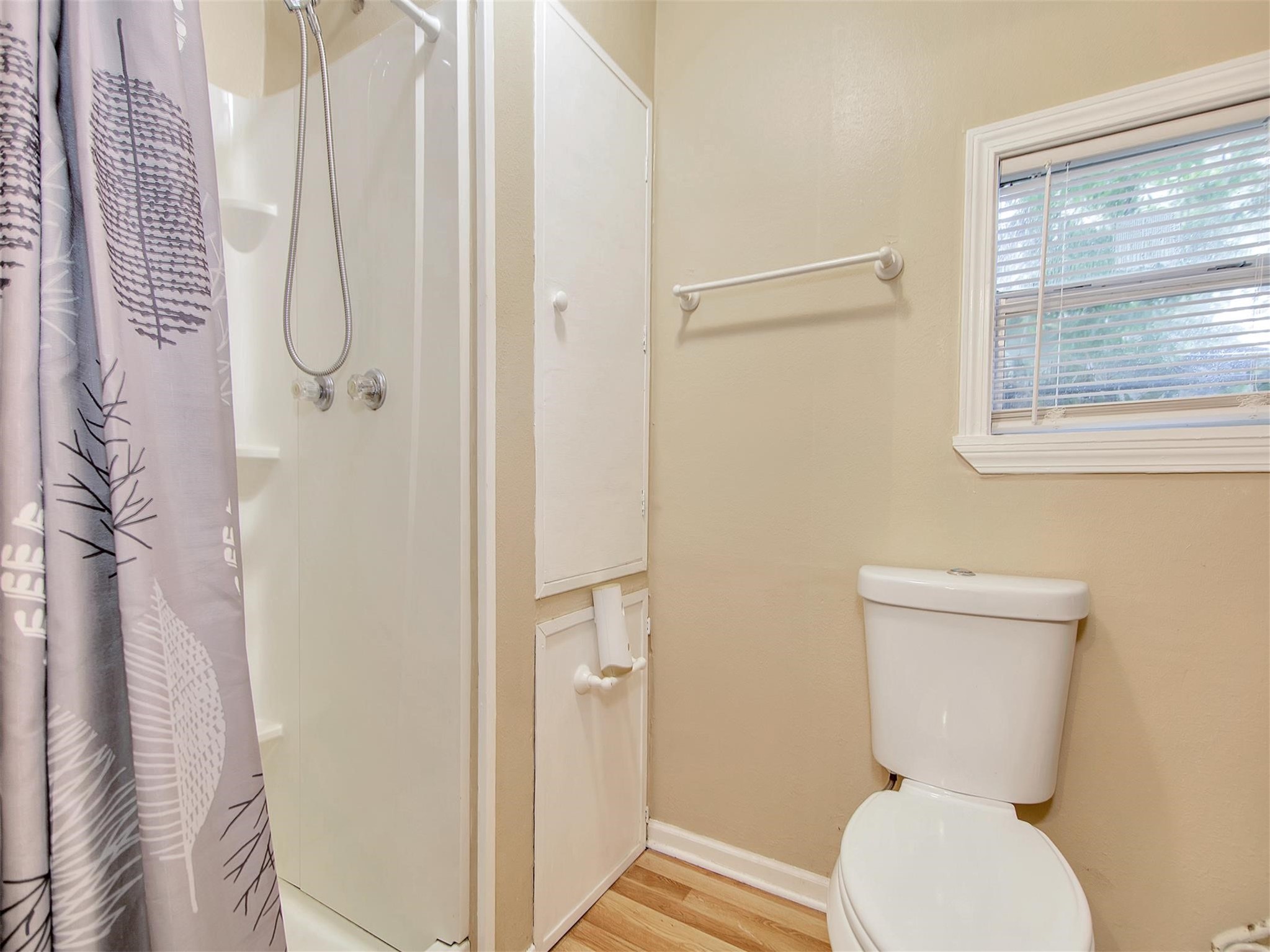5207 McCormick Street Houston, TX 77023 - Photo 26 of 33 a bathroom with a toilet and a shower