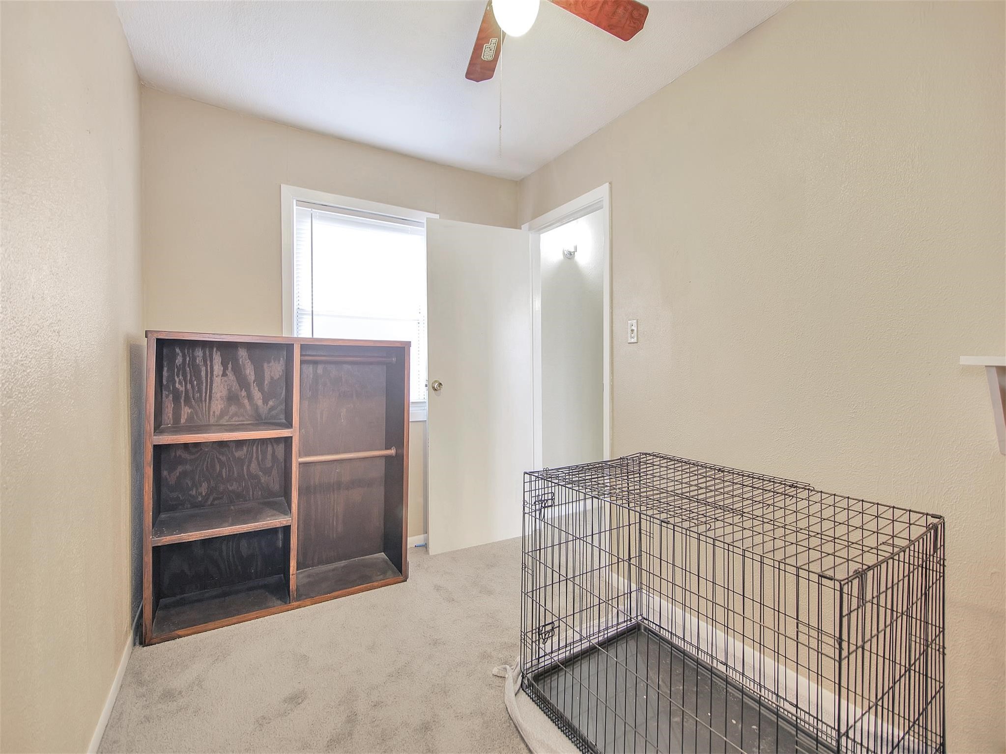 5207 McCormick Street Houston, TX 77023 - Photo 27 of 33 a view of an empty room with cabinet and a window