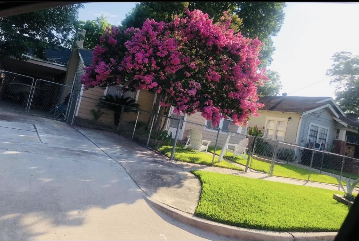 5207 McCormick Street Houston, TX 77023 - Photo 33 of 33 a view of backyard with swimming pool and outdoor seating