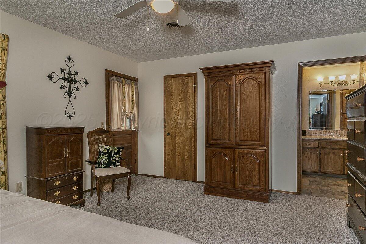 109 Caprock Lane Amarillo, TX 79118 - Photo 19 of 32 a view of a livingroom with furniture and windows