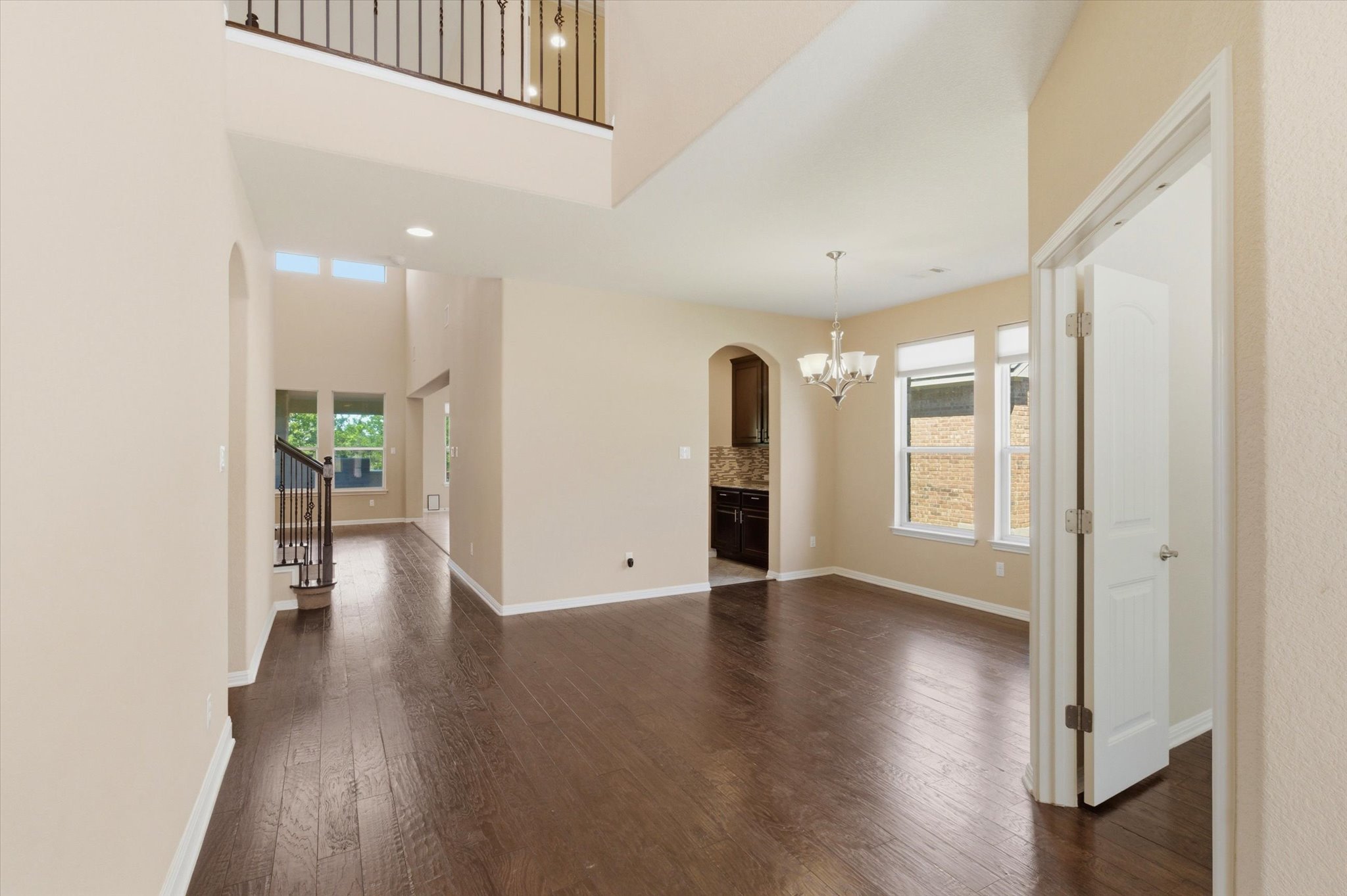 1511 Rimstone Drive Cedar Park, TX 78613 - Photo 39 of 39 An open floorplan with rich hardwood floors welcomes you into this inviting home.