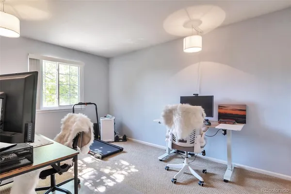 a room with furniture and a window