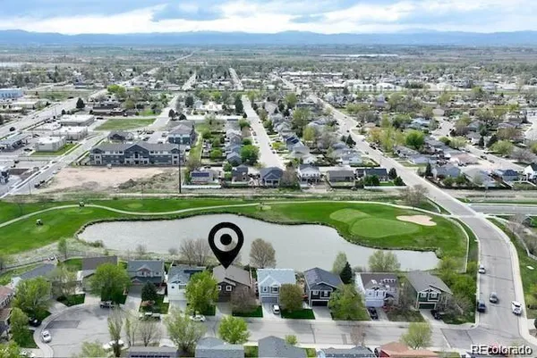 an aerial view of a city with lots of residential buildings