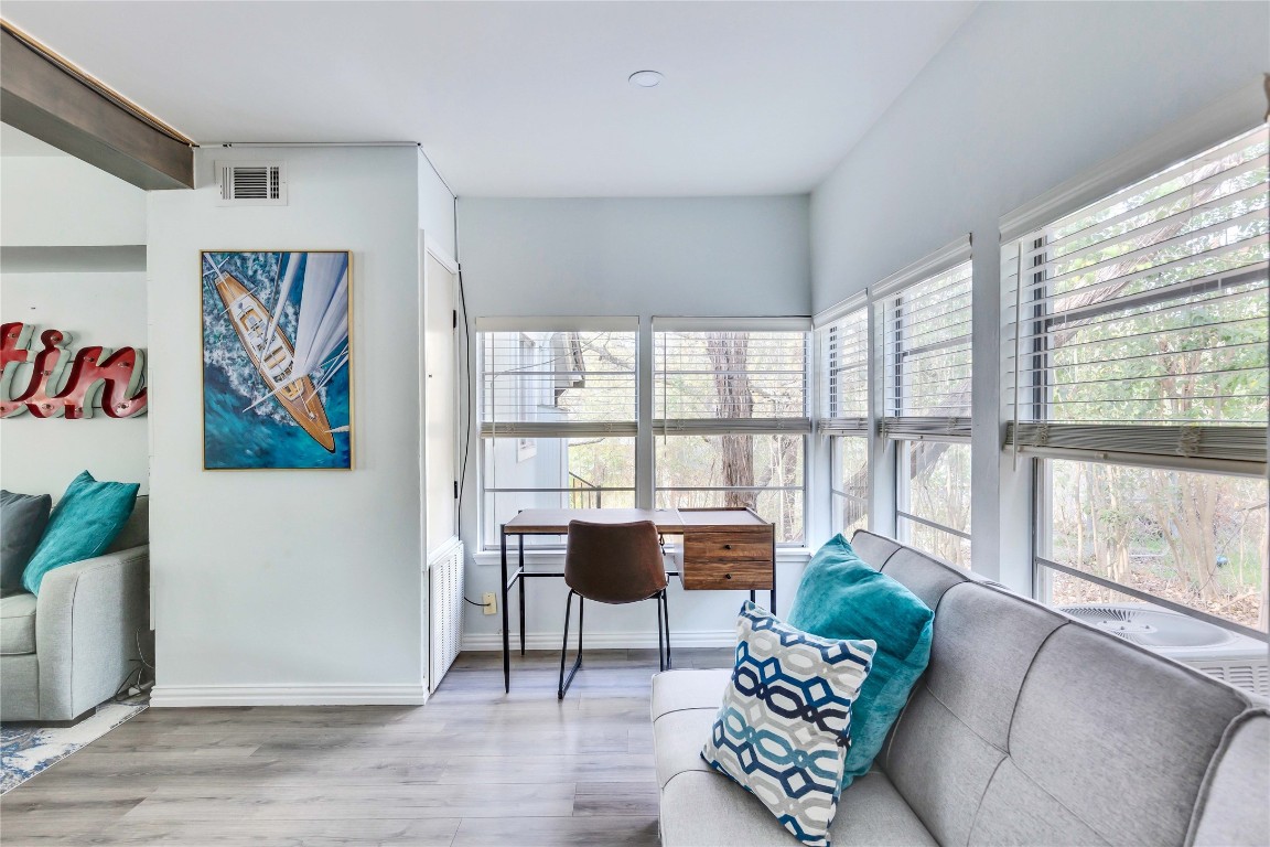 16108 Aqua Azul Path Austin, TX 78734 - Photo 16 of 40 a living room with furniture and a large window